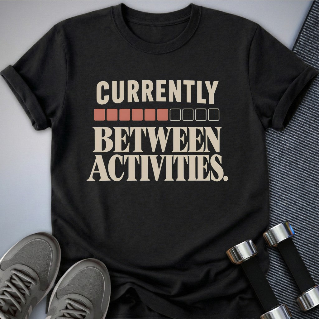 Printify T-Shirt Dark Grey Heather / S Currently Between Activities T-Shirt