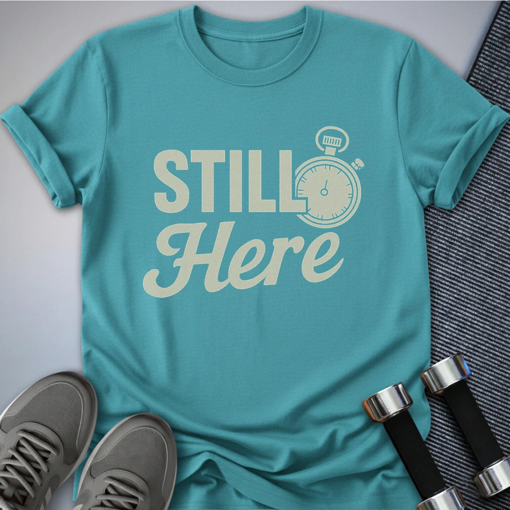 Printify T-Shirt Aqua / S She's Still Here T-Shirt