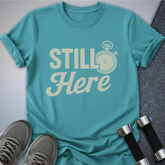 Printify T-Shirt Aqua / S She's Still Here T-Shirt