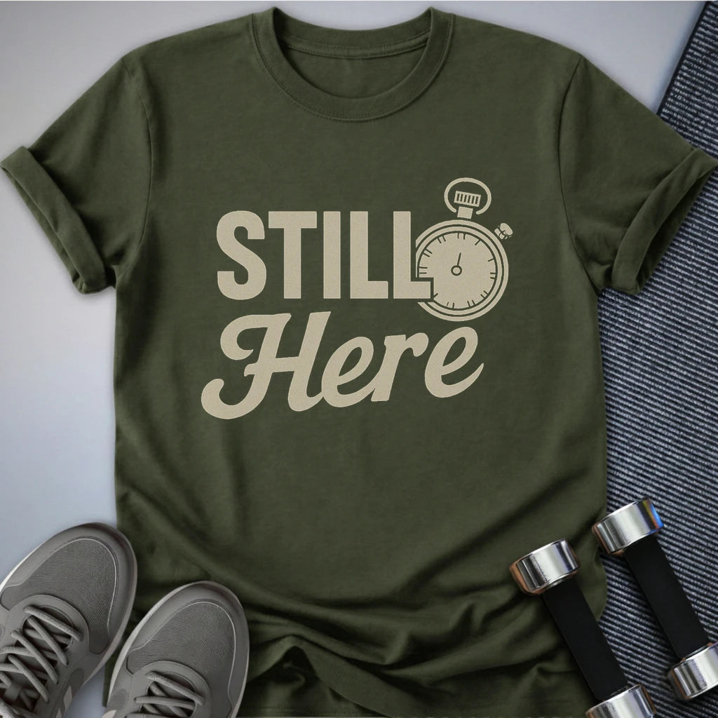 Printify T-Shirt Military Green / S She's Still Here T-Shirt