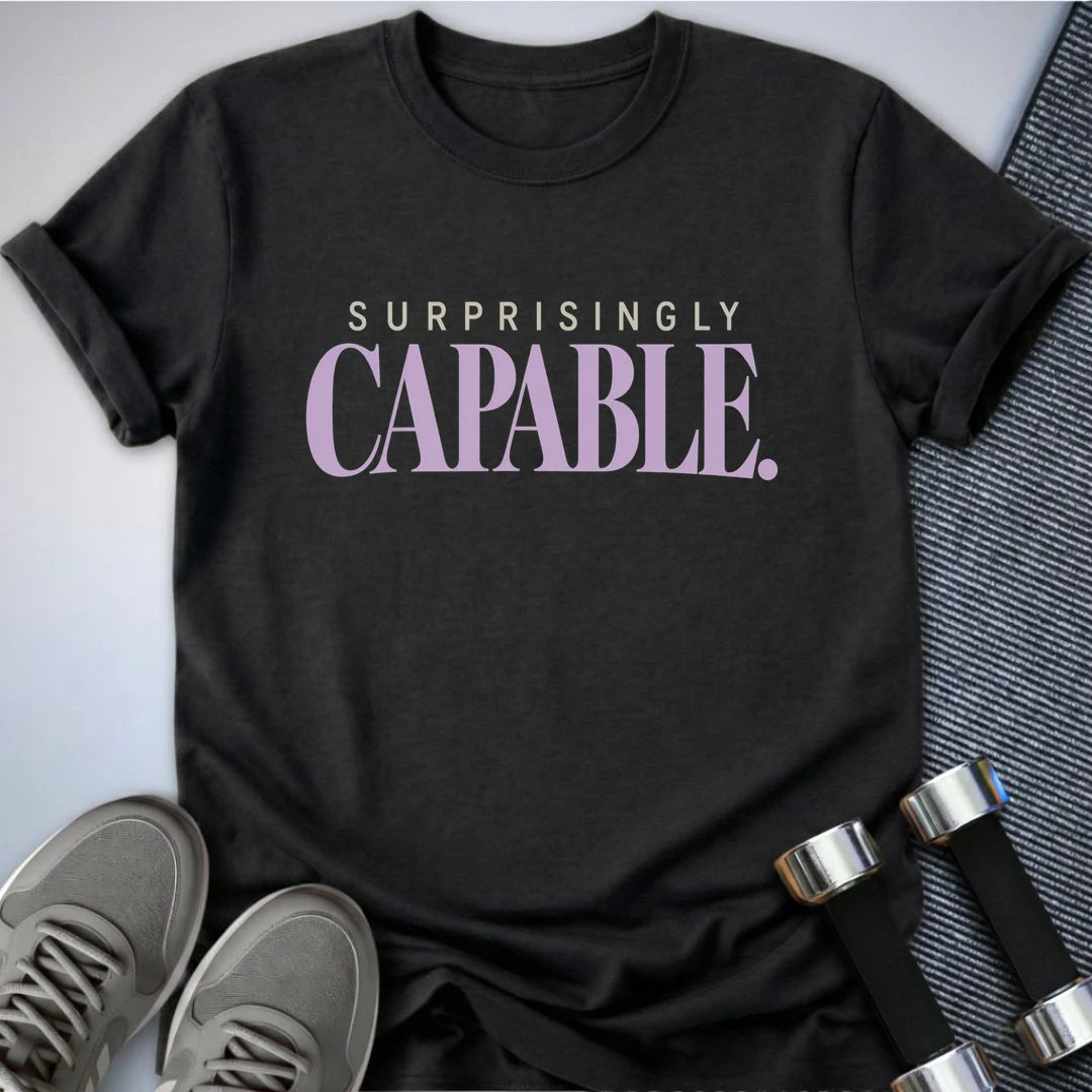Printify T-Shirt Dark Grey Heather / S Surprisingly Capable T-Shirt
